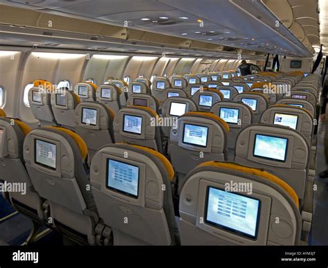 interior view in an aeroplane cabin seats economy class inseat video ...