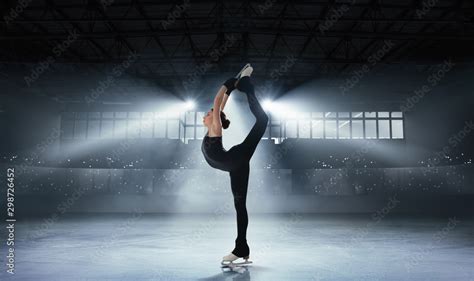 Figure skating girl in ice arena. Stock Photo | Adobe Stock