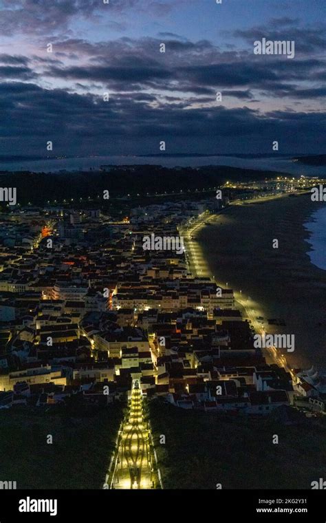 View of the illuminated streets of Nazare from the lighthouse Stock Photo - Alamy