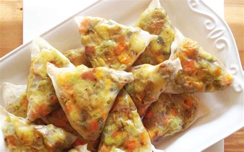 In this recipe, rice paper wraps are filled with a mixture of fresh vegetables is combined with ...