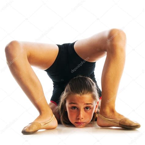 Unhappy gymnast doing exercise Stock Photo by ©nanka-photo 81781916