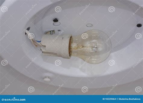 A Light Bulb in the Fixture. Stock Photo - Image of conservation, building: 93339464