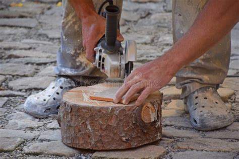 Man Cutting Ceramic Tile with Angle Grinder Stock Image - Image of renovation, workspace: 137614317