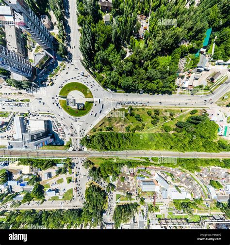 Aerial city view with roads, houses and buildings Stock Photo - Alamy