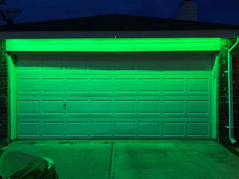 Finally got my custom installation done for my garage door. LED strip is run by a Philips Hue ...