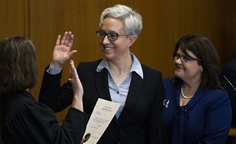 Oregon Gov. Tina Kotek takes office with a promise to 'make things ...