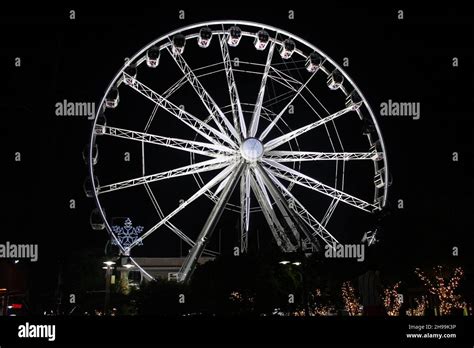 Cape Wheel, a large observation Ferris wheel illuminated at night in ...