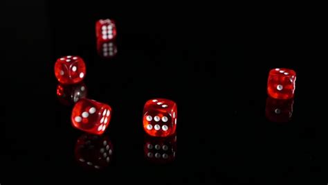 Throwing red dice on a black background in the casino. 3 pack. Slow ...