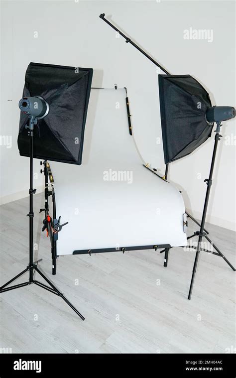 white studio setup with lights table for object picture white background Stock Photo - Alamy