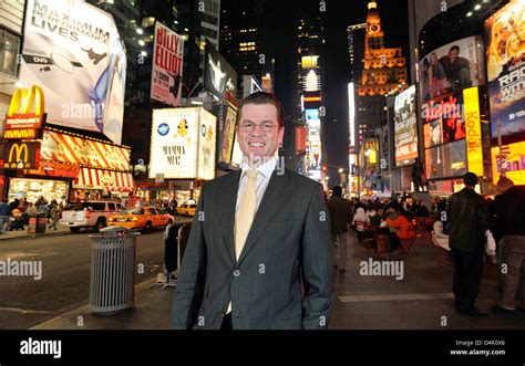 German Economy Minister Karl-Theodor zu Guttenberg seen on Times Square ...