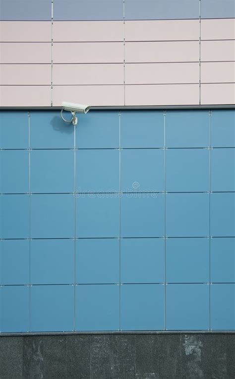 Security camera on a wall stock photo. Image of line - 16318694