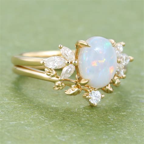 Gardensring Oval Cut Opal Yellow Gold Bridal Ring Set - gardensring