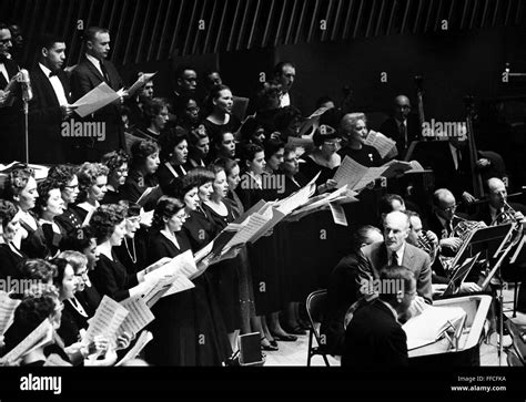 UNITED NATIONS DAY, 1959. /nHugh Ross rehearsing the Schola Cantorum at the United Nations ...