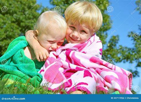 Brothers Hugging In Beach Towels Royalty Free Stock Image - Image: 33711956