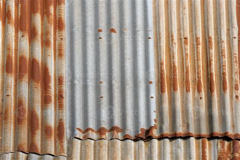 Artistic of old and rusty zinc sheet wall. Vintage style metal sheet roof texture. Pattern of ...