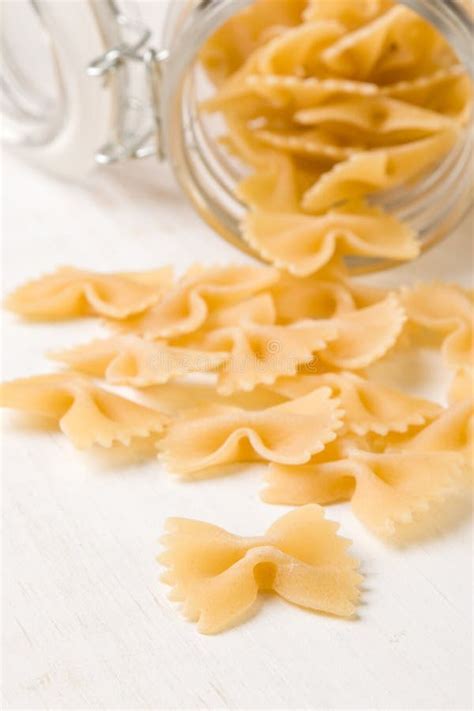 Raw farfalle bow-tie pasta stock photo. Image of italy - 86015176