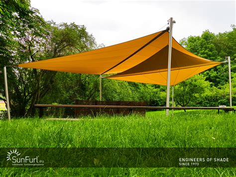 Freestanding awnings can be shade sails or bioclimatic pergolas