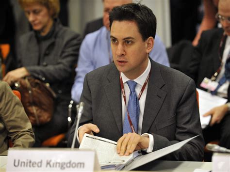 Miliband is under pressure to back the government's climate change plan