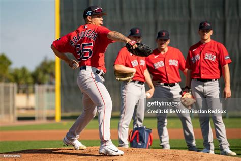 Oddanier Mosqueda of the Boston Red Sox practices a pick-off during a ...