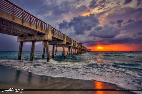 Juno Beach Pier Sunrise Storm Breaking Wave | Royal Stock Photo