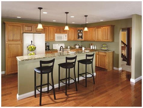 Hickory Kitchen Cabinets | Green kitchen walls, Hickory kitchen cabinets, Light green kitchen