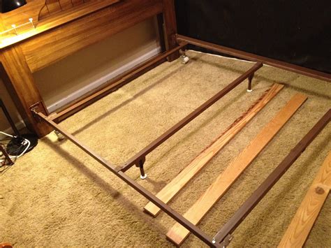 furniture - Why won't this bed's feet touch the floor? - Home Improvement Stack Exchange