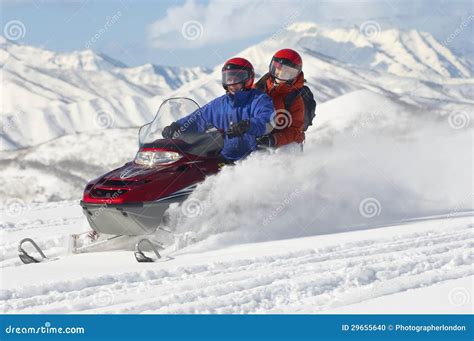 Couple Riding Motor Sledge Stock Photo - Image: 29655640