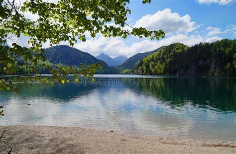 Emerald-green Lake Alpsee in Alps in Hohenschwangau Near Castles Hohenschwangau and ...