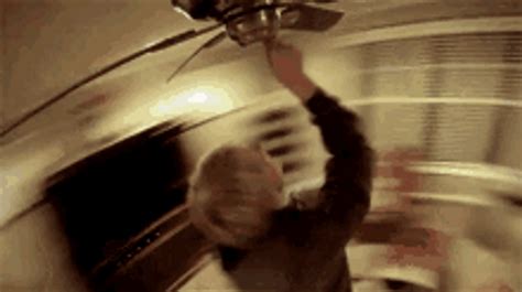 Man Spinning With Ceiling Fan GIF | GIFDB.com