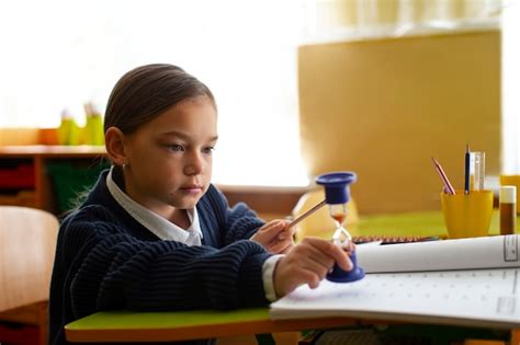 Free Photo | Back view girl learning math at school