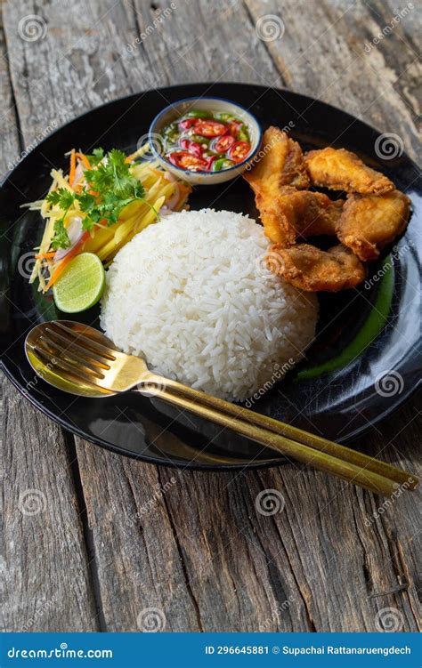 Rice fried fish stock image. Image of vegetable, crispy - 296645881