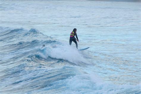 young athletes practising the water sport of surfing 23327561 Stock ...