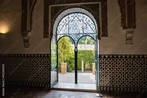 Interiors of Alcazar palace in Sevilla. With beautiful formal public ...