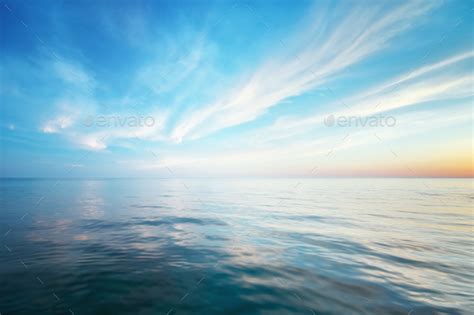 Sky background and water reflection. Stock Photo by rozum | PhotoDune