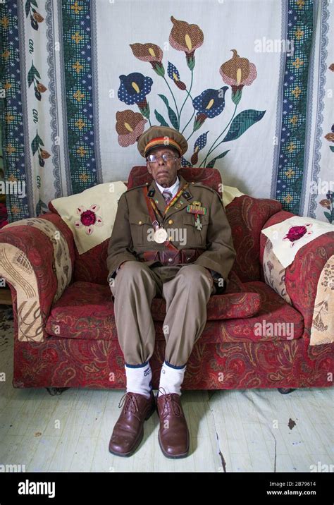 Ethiopian veteran from the italo-ethiopian war in army uniform in his home, Addis Ababa Region ...