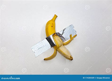 Banana Duct Taped To the White Wall. Conceptual Photo Stock Image ...