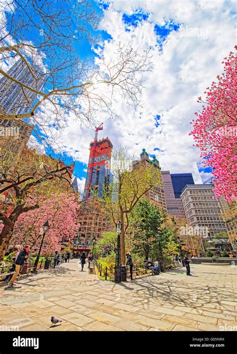 New York, USA - April 24, 2015: City Hall Park with tourists, Lower ...