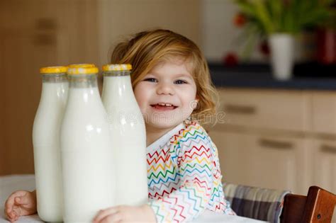 Adorable Toddler Girl Drinking Cow Milk for Breakfast. Cute Baby ...