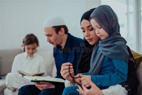 Happy Muslim Family Enjoying the Holy Month of Ramadan while Praying ...