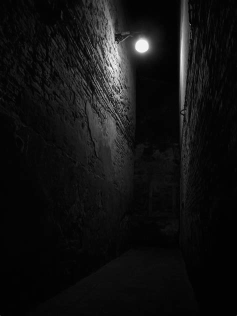 Light in alleyway. The lighting really describes the atmosphere and feel of the movie very well ...