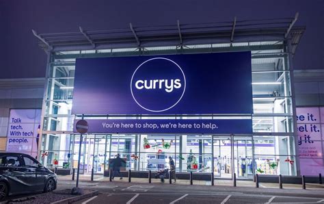 UK retailer Currys raises staff pay for third time in 13 months | Reuters