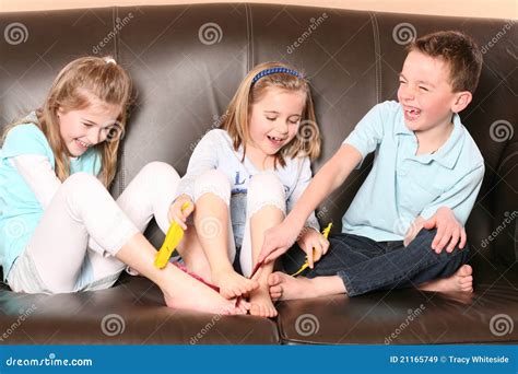 Children Tickling Feet with Feather Stock Image - Image of female, love ...