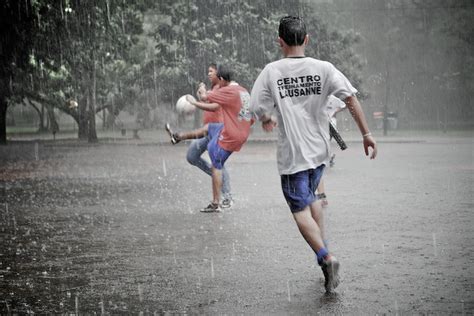 Teenagers playing soccer in the rain | Flickr - Photo Sharing!