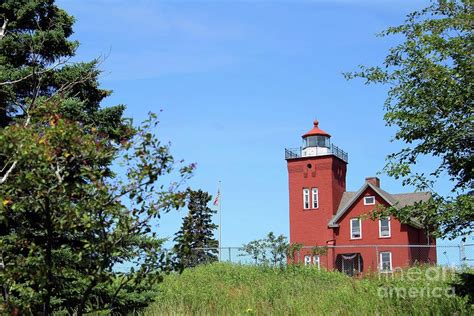 Two Harbors Lighthouse Photograph by Jimmy Ostgard - Fine Art America