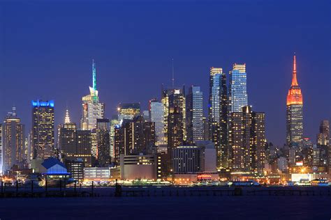 Manhattan Skyline at night Photograph by John Lan