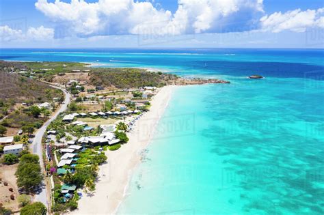 Aerial view by drone of tropical white sand of Turners Beach, Antigua, Antigua and Barbuda ...