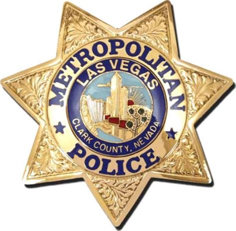 the metropolitan las vegas police badge is shown in this file photo ...