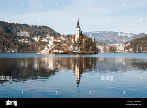 Lake Bled with castle behind in winter, Bled, Slovenia Stock Photo - Alamy