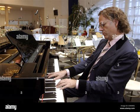 (dpa) - Dutch star violinist Andre Rieu plays the piano at his studio Stock Photo, Royalty Free ...