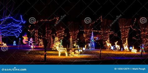 The Glow of Christmas Lights Against the Fresh Snow Stock Image - Image ...